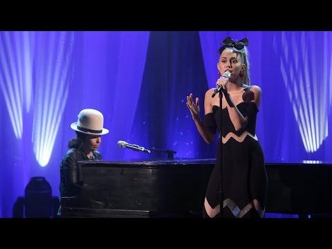 Miley Cyrus Performs 'Hands of Love' with Linda Perry